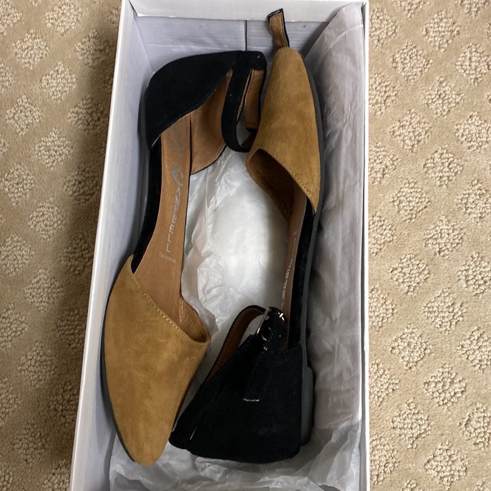 Suede black and beige flats . Size 6 . Ankle strap.